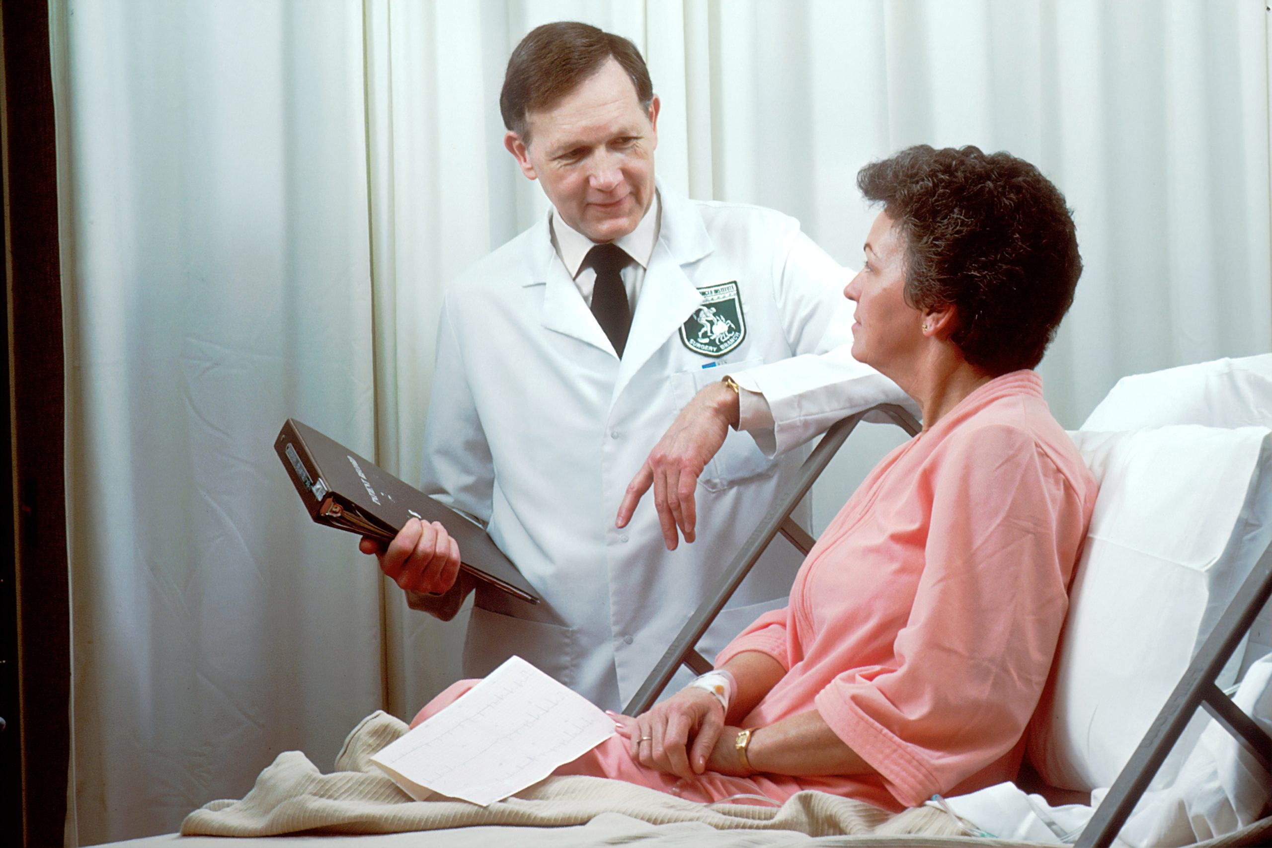 Doctor doing an annual wellness visit with a patient